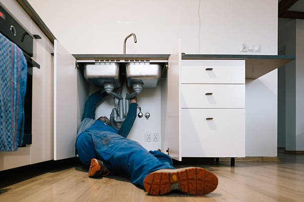 Professional Drain Cleaning technician working in Camdenton, MO
